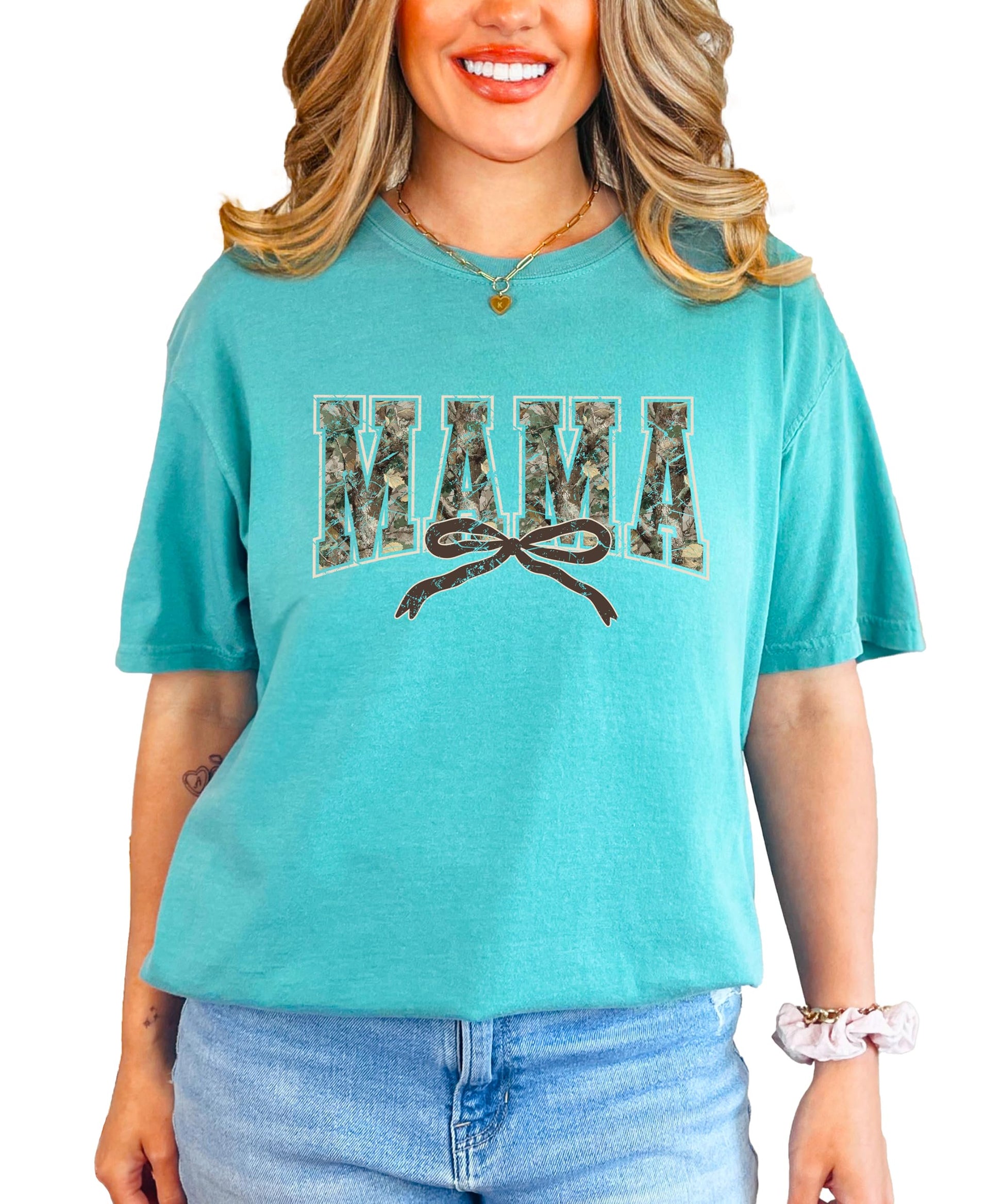 Seafoam women's t-shirt with camo varsity letter Mama graphic and coquette bow design, front view