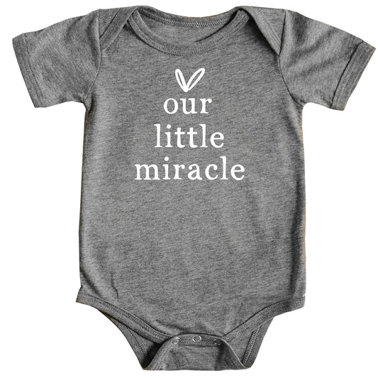 Our Little Miracle baby bodysuit in military green displayed on a soft background