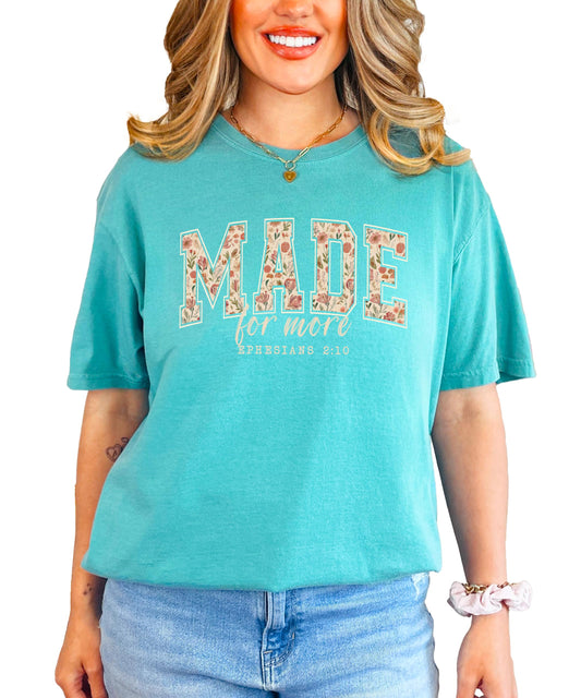 Close-up of Made for More Ephesians 2:10 floral print on women's faith-based graphic tee
