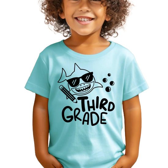 Back to school shark graphic tee for boys displayed on white background