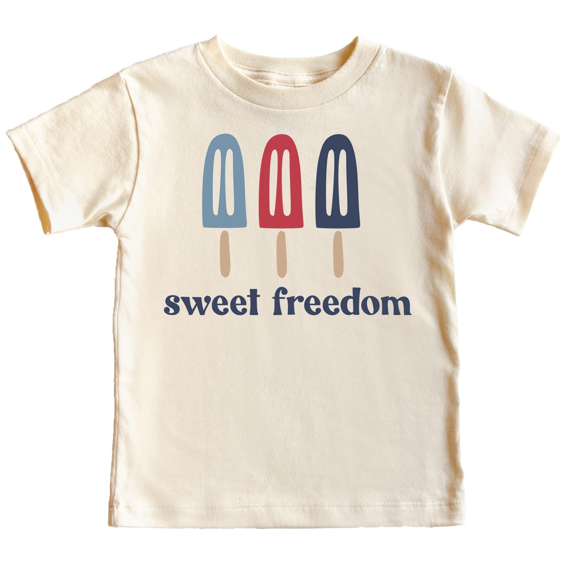 Close-up of Sweet Freedom Popsicle graphic design on pink t-shirt