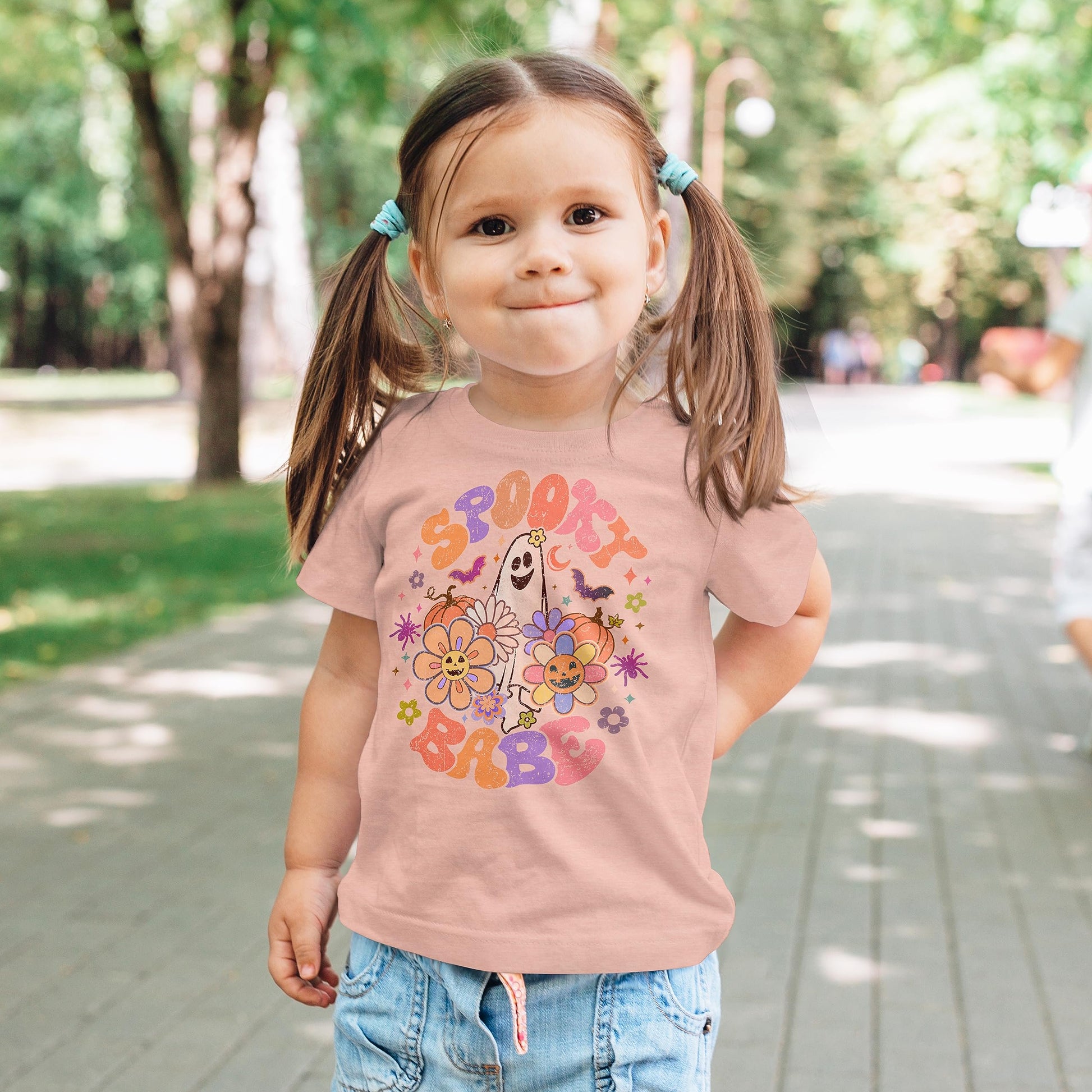 Detail shot of bold ghost graphic print on Spooky Babe Halloween kids shirt