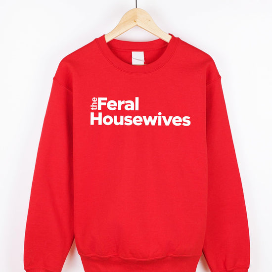 Detail shot of Feral Housewives sweatshirt print quality on gray fabric