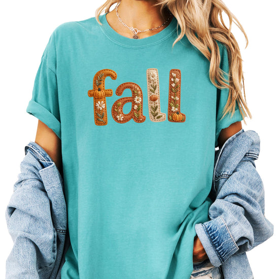 Seafoam faux embroidery fall tee with pumpkin and floral design on model