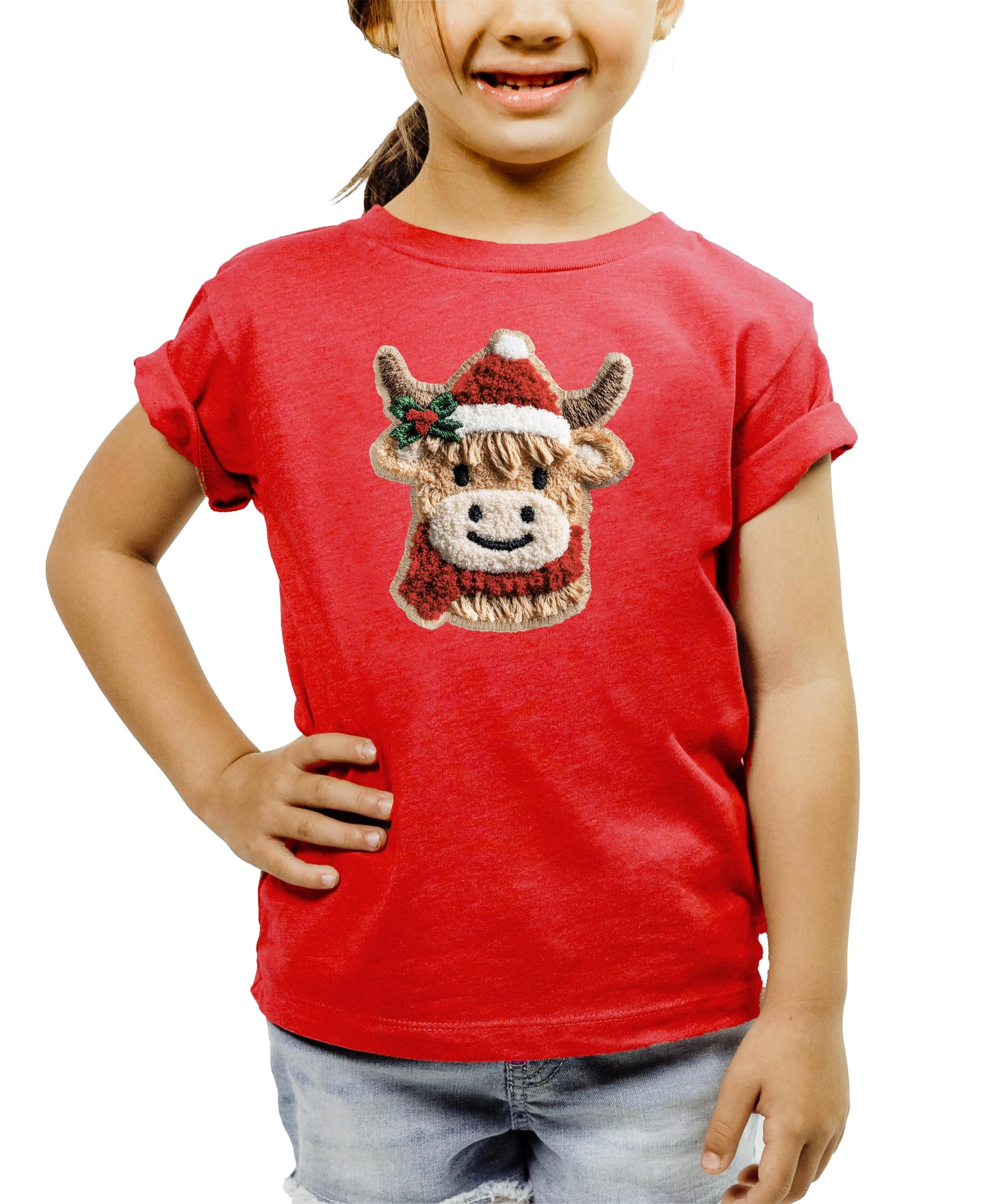 Full-length view of child wearing red cow Santa holiday graphic tee
