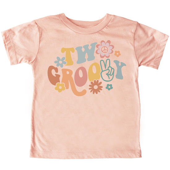 Close-up of Two Groovy text with colorful daisy flowers design on toddler birthday shirt