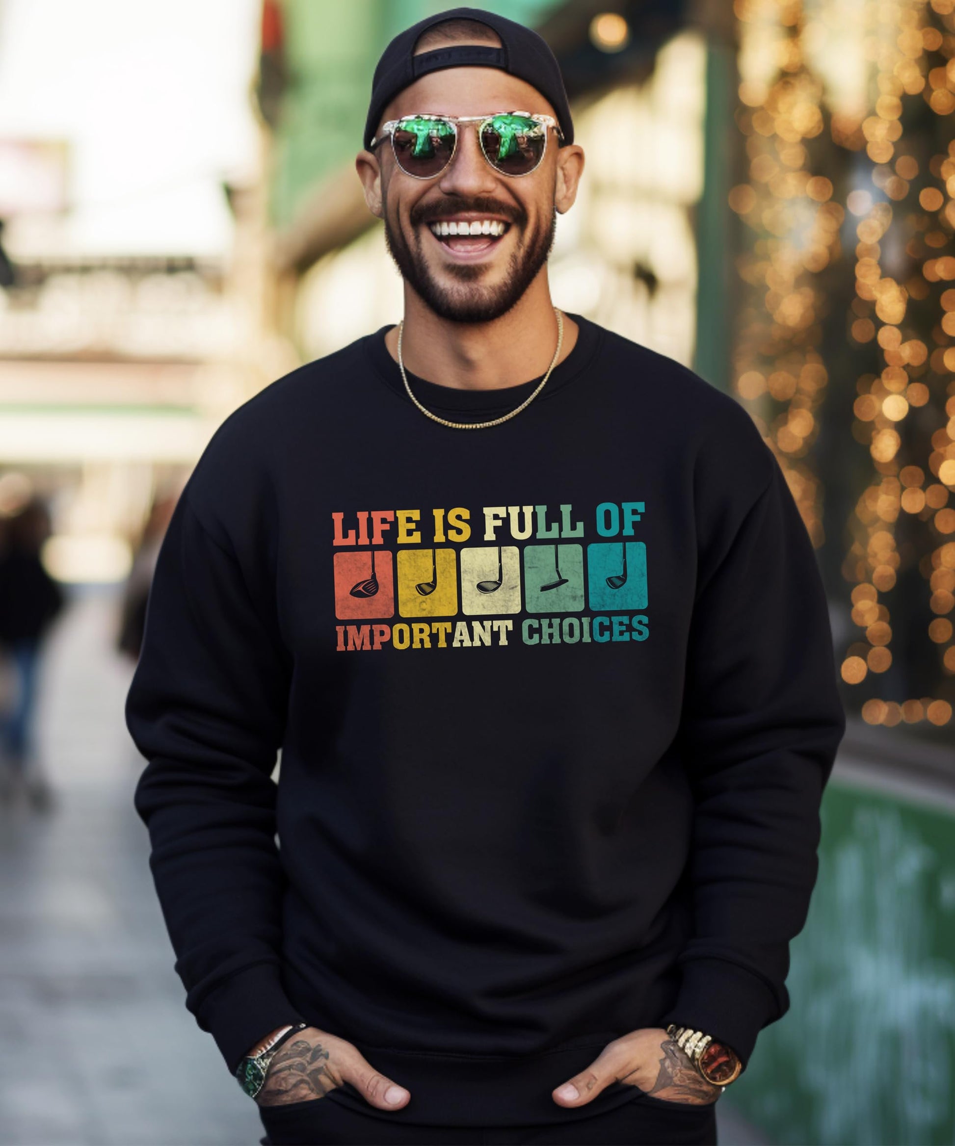 Close-up of bold golf club graphic print on black men's crewneck sweatshirt by Olive Loves Apple