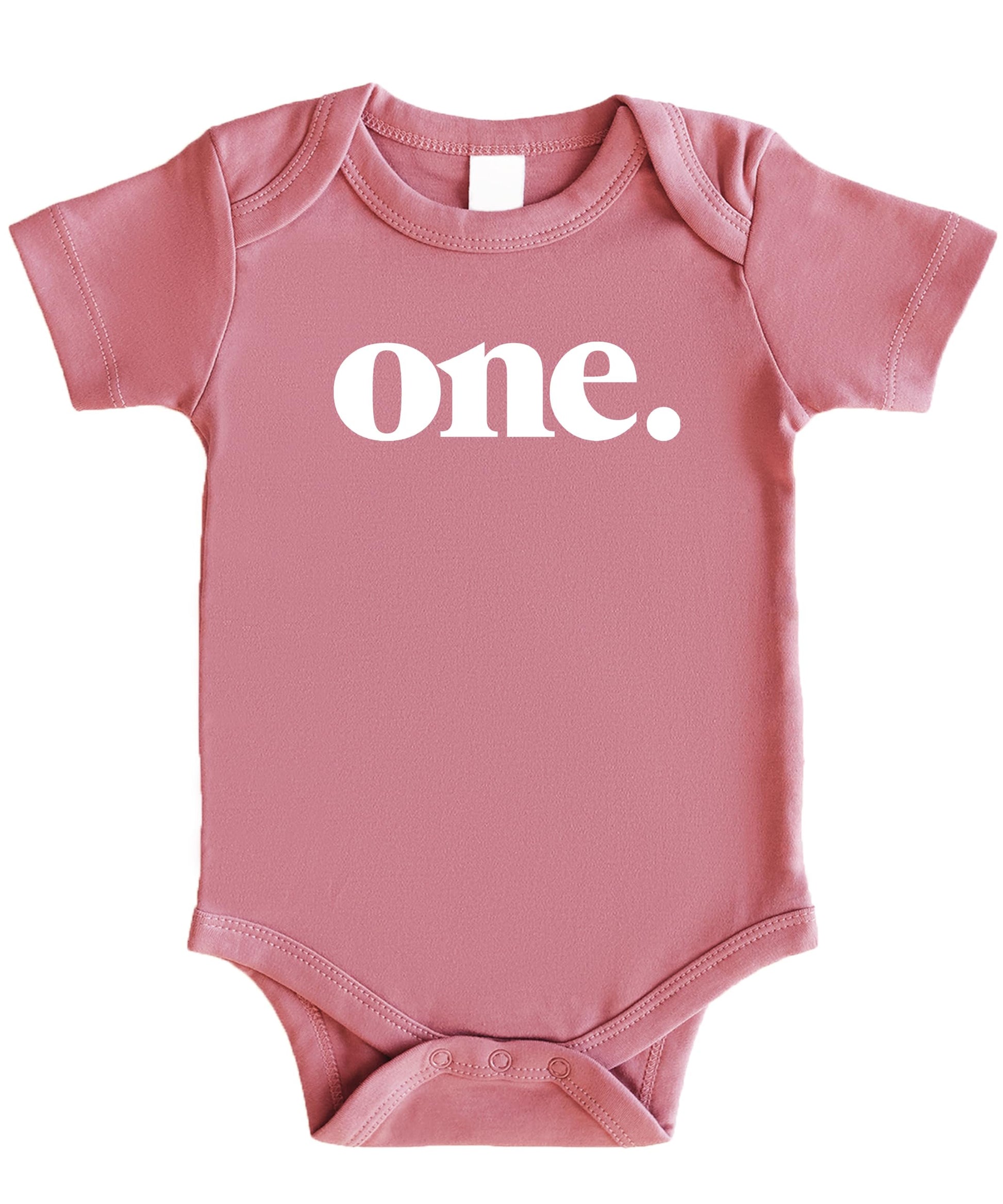 Bold One 1st birthday bodysuit in white on mauve for baby first birthday outfit by Olive Loves Apple