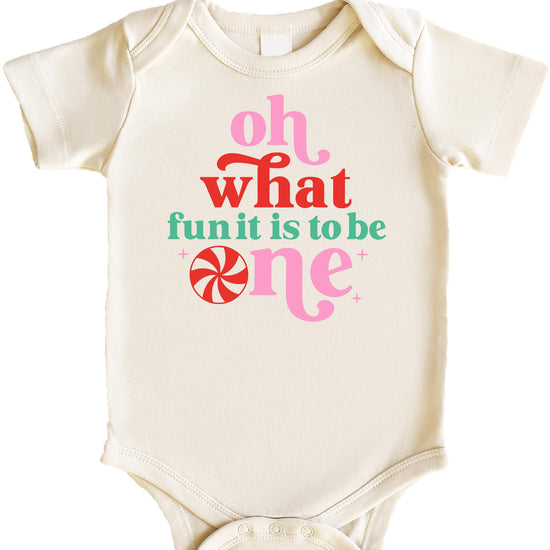 White baby girl bodysuit with Oh What Fun It Is To Be One Christmas birthday graphic print