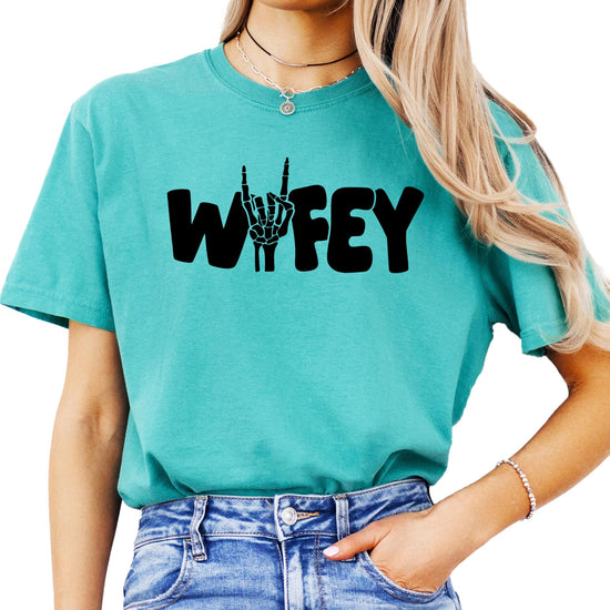 Close-up of Wifey skeleton hand graphic design on Halloween t-shirt