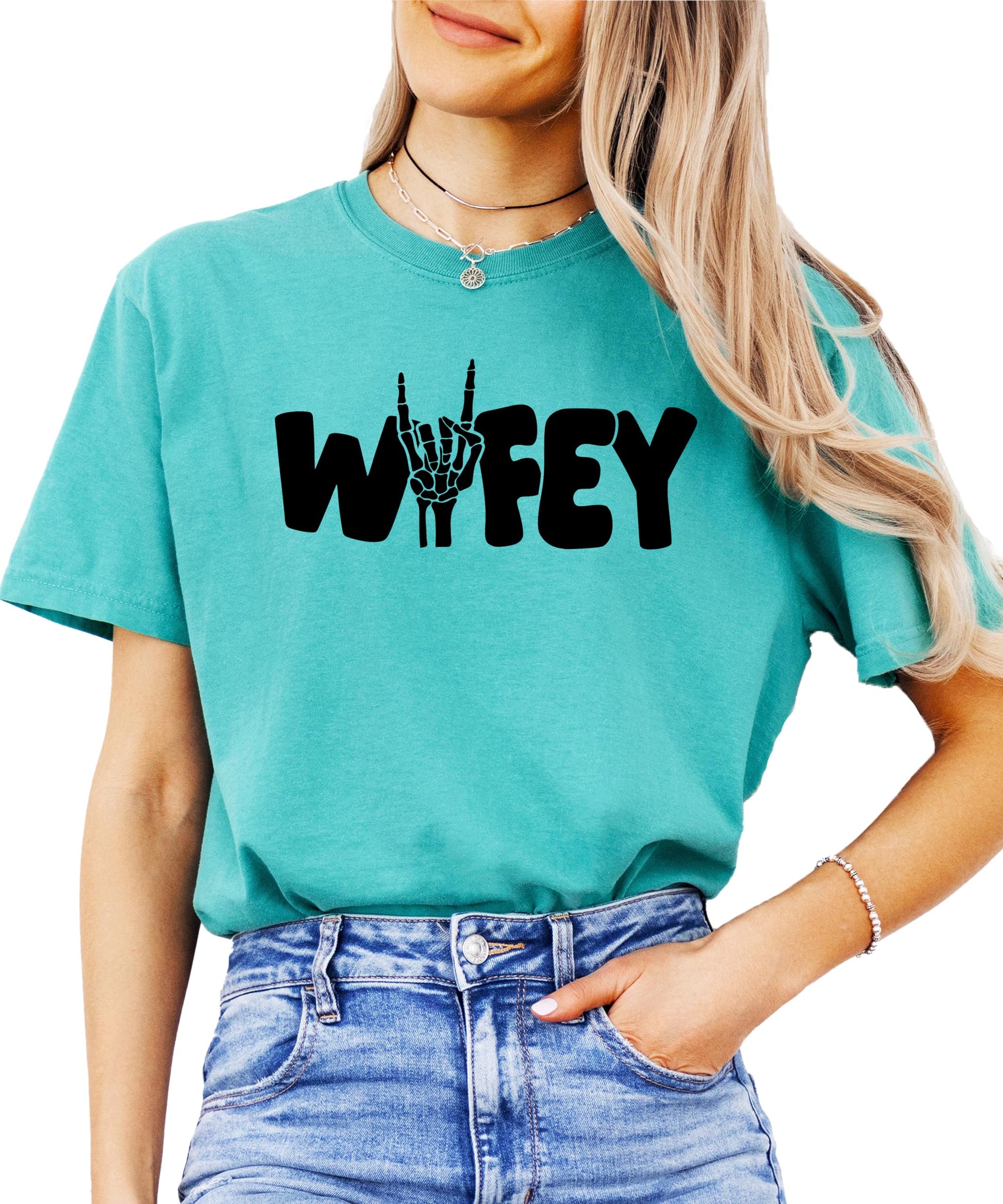 Close-up of Wifey skeleton hand graphic design on Halloween t-shirt