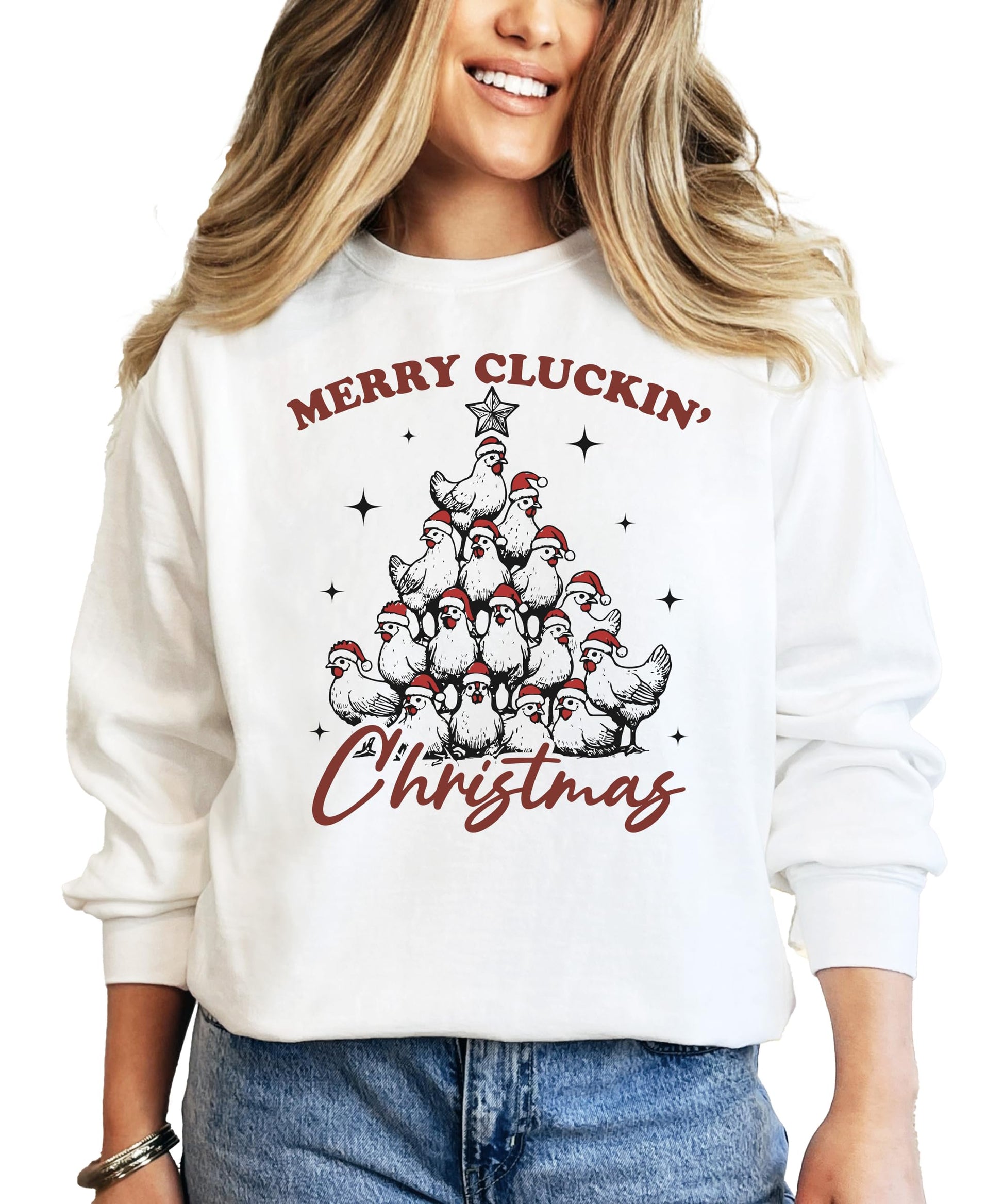 White women's pullover sweatshirt with a funny Merry Cluckin' Christmas chicken Santa hat Christmas tree graphic