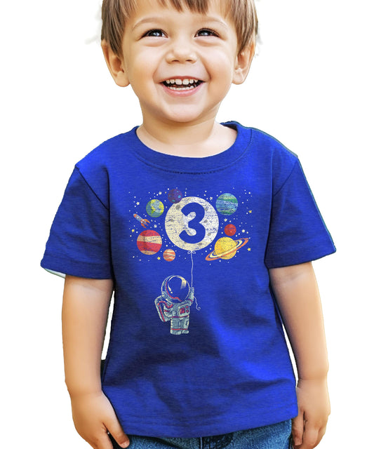 Toddler wearing black space themed birthday t-shirt with rocket and planets