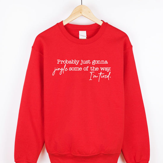 Detail shot of soft fleece fabric on red funny holiday sweatshirt for women