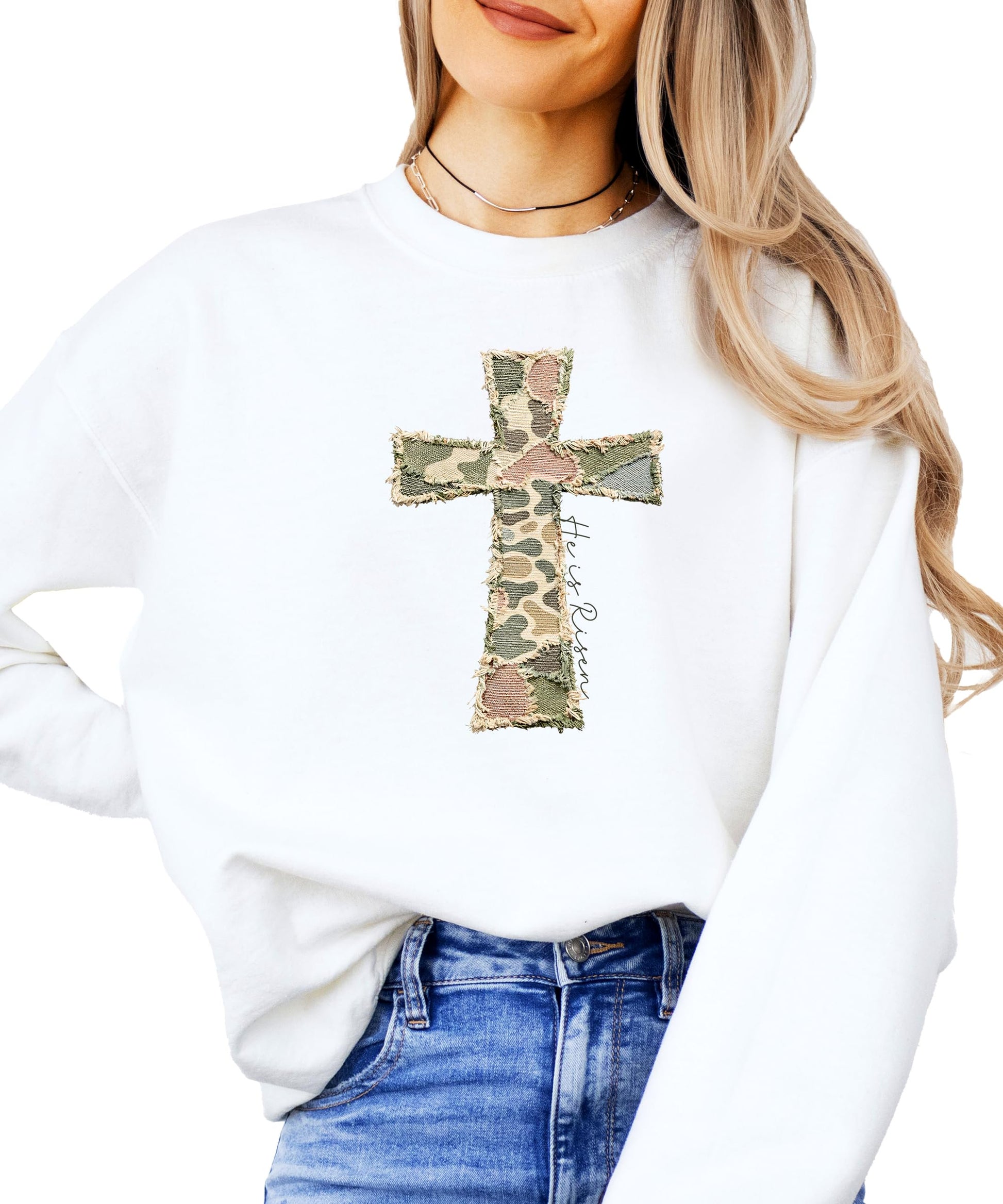 Women modeling camo He Is Risen Easter sweatshirt, casual faith-inspired pullover style