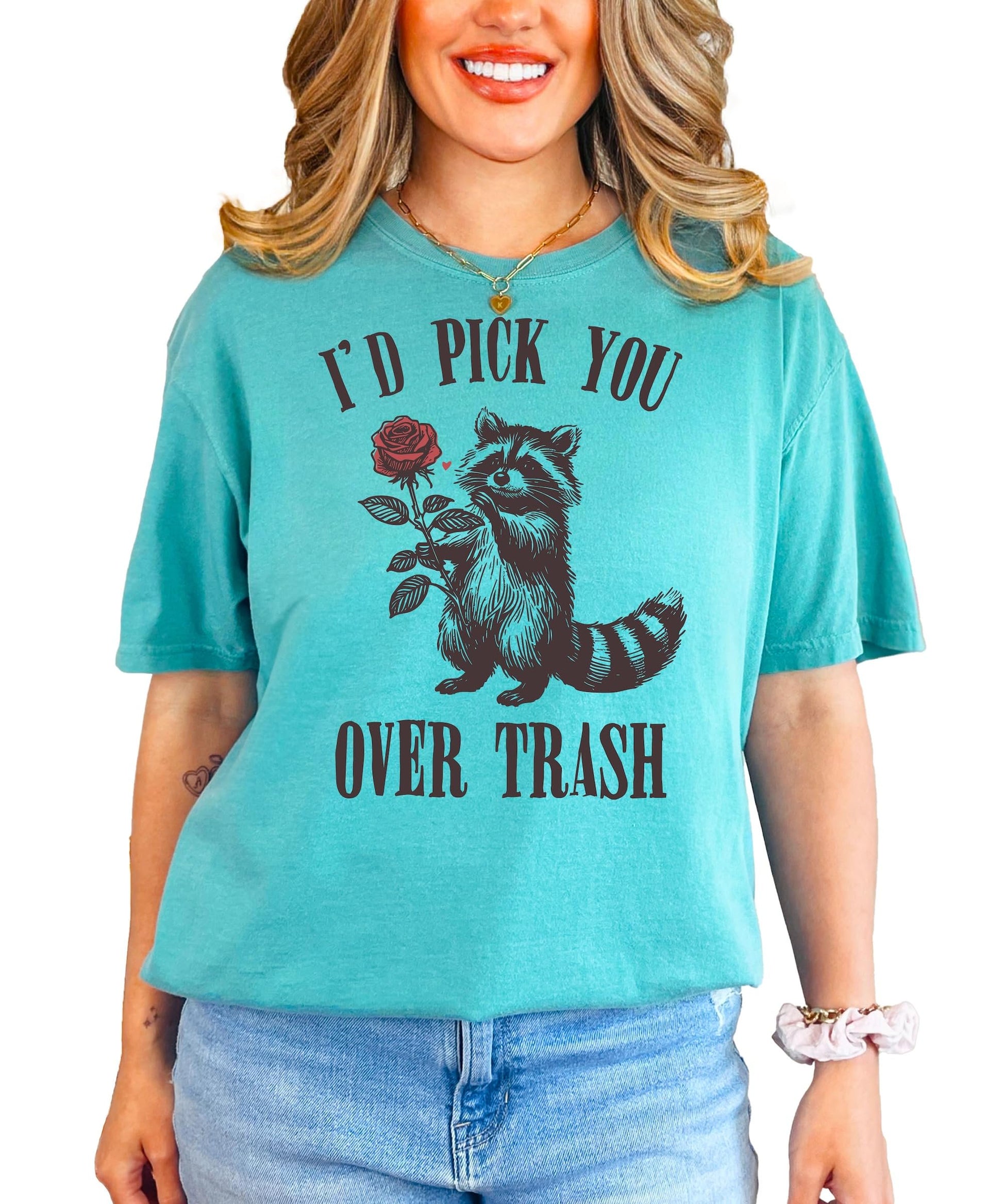 Side or lifestyle view of women's funny raccoon Valentine's Day graphic t-shirt in ivory