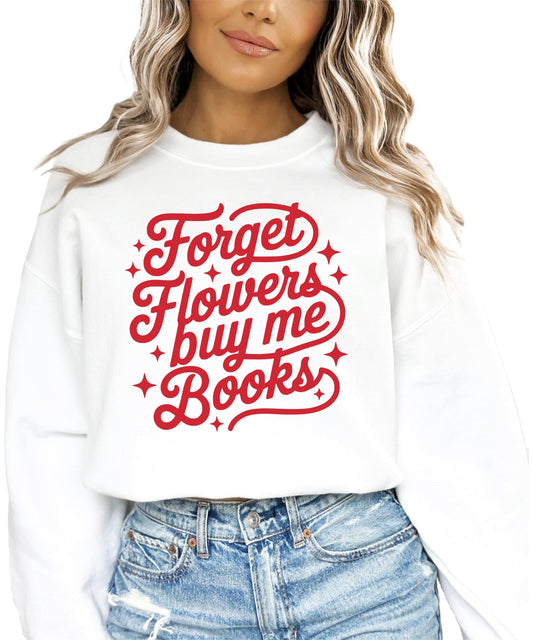 Close-up of 'Forget Flowers Buy Me Books' sweatshirt print detail on white fleece fabric