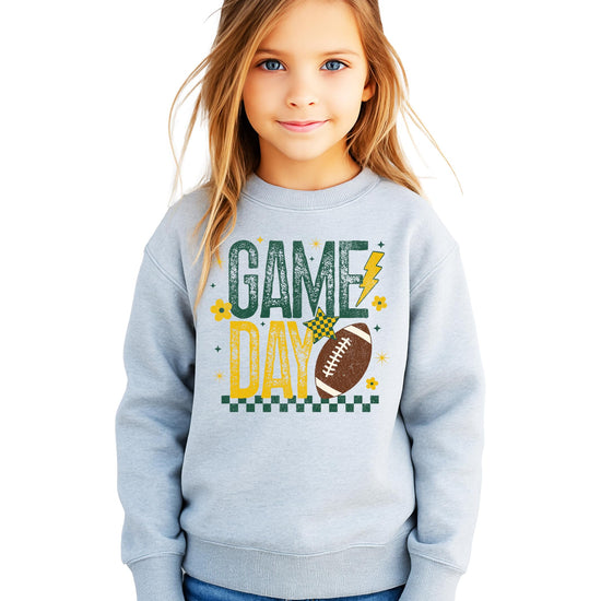 Close-up of football and flower graphic print in green and yellow colors