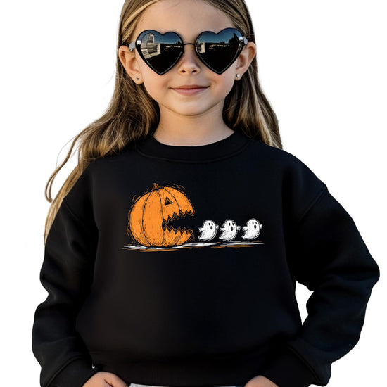 Close-up of pumpkin chomping ghosts Halloween graphic on a soft cozy sweatshirt