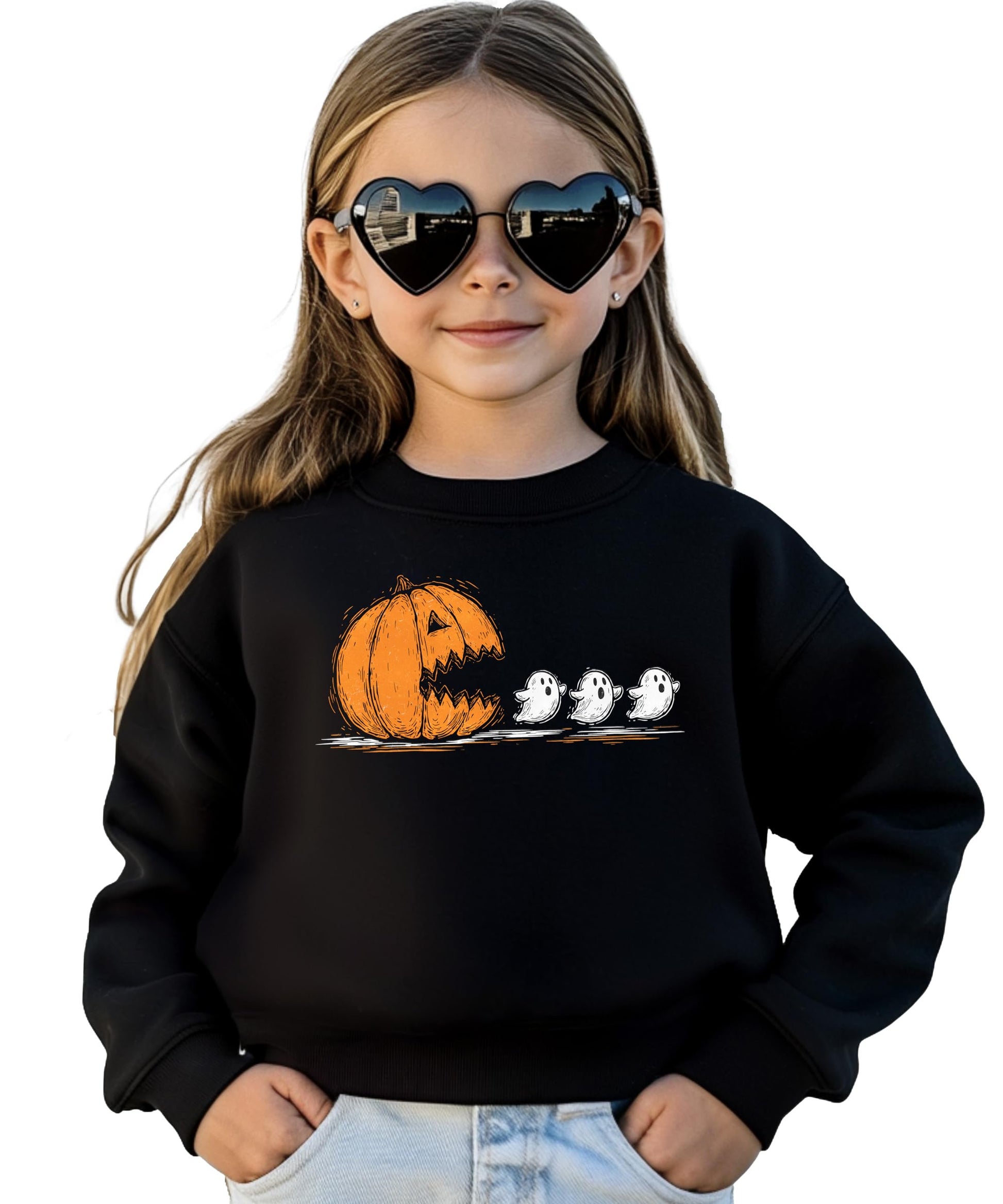 Close-up of pumpkin chomping ghosts Halloween graphic on a soft cozy sweatshirt