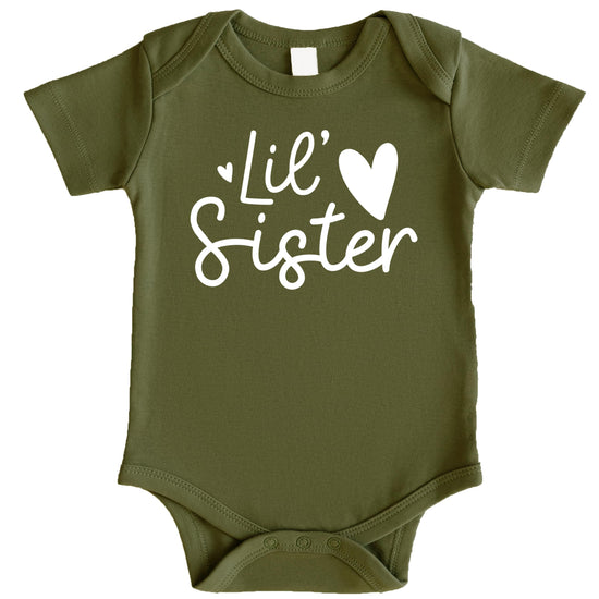 Close-up of Lil Sister heart print on mauve infant bodysuit