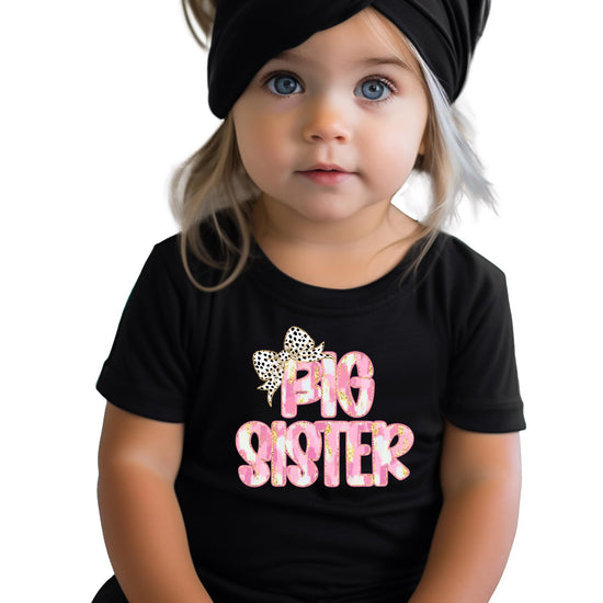 Back view of black Big Sister graphic tee for girls