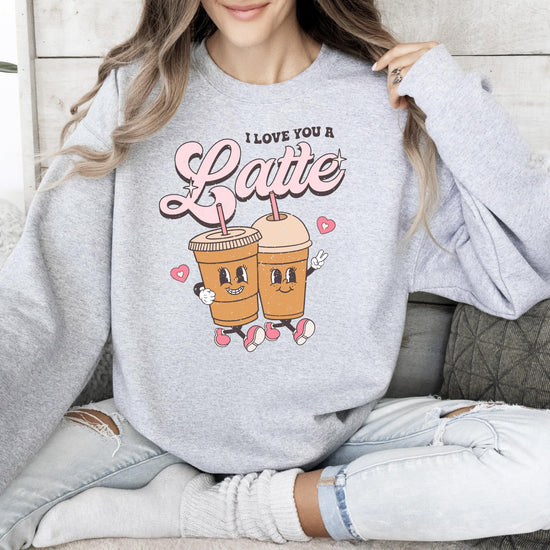I Love You A Latte funny Valentine's sweatshirt lifestyle flat lay in gray
