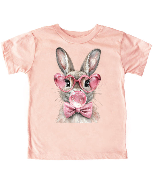 Girls Easter bubble gum bunny graphic tee with heart glasses and bow on peach shirt