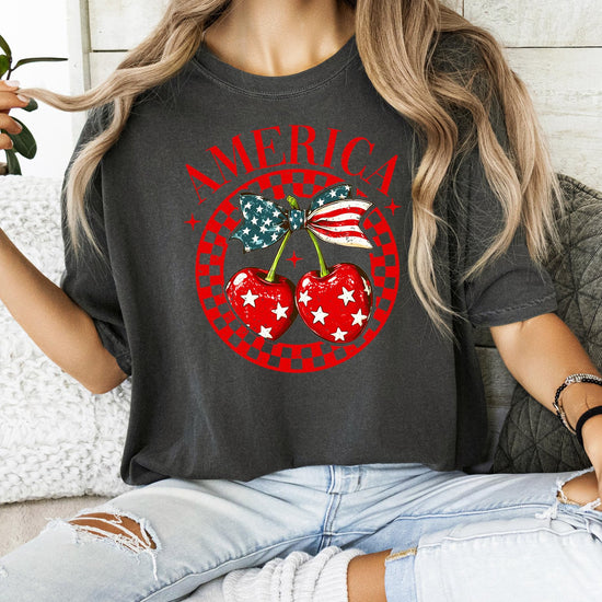 Detail shot of patriotic cherry bow graphic with red, white and blue elements