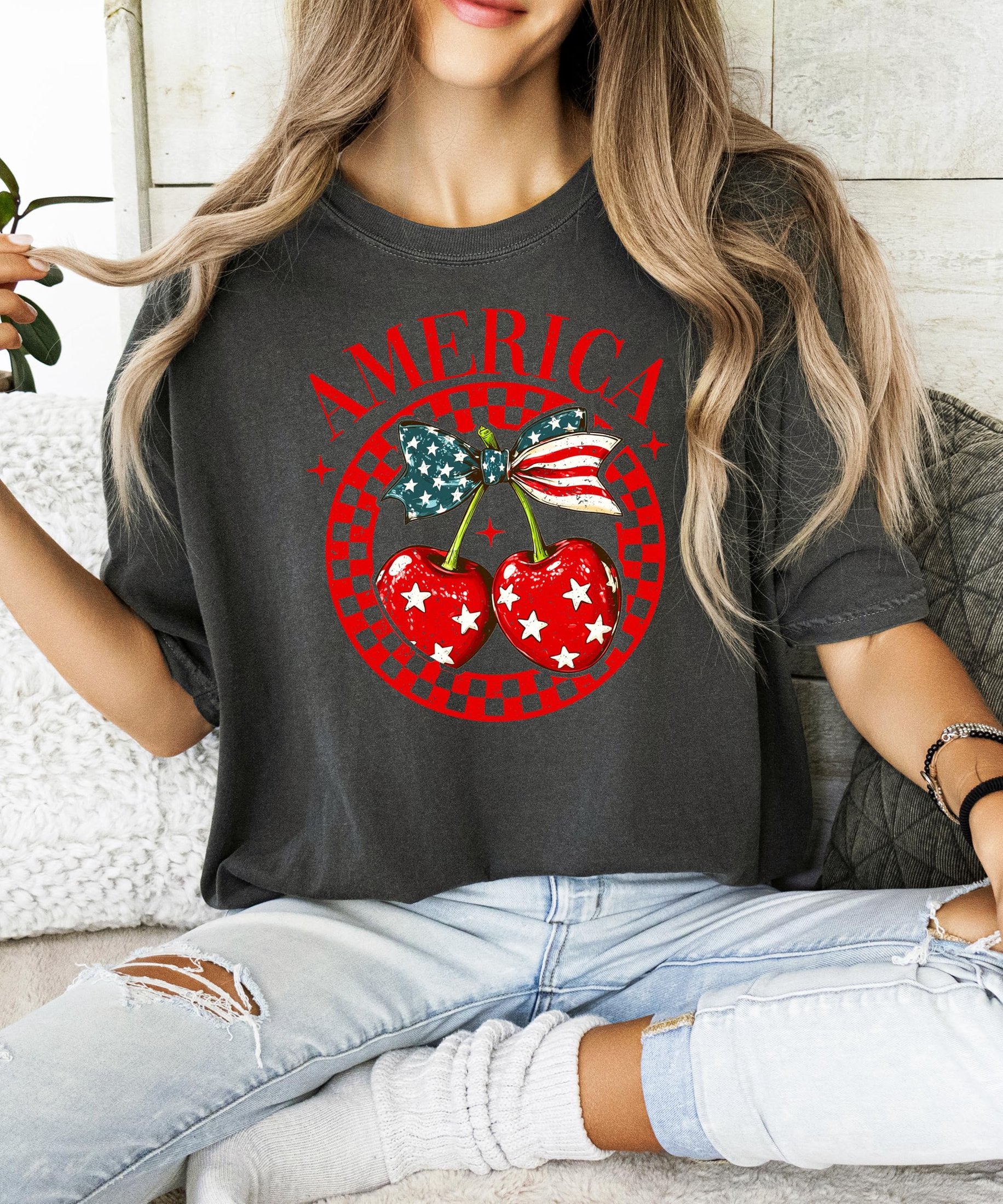 Detail shot of patriotic cherry bow graphic with red, white and blue elements