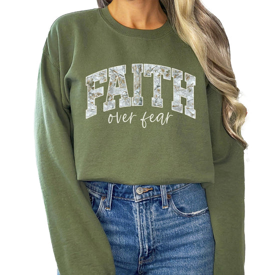 Army green Faith Over Fear pullover sweatshirt with collegiate-style rustic lettering graphic