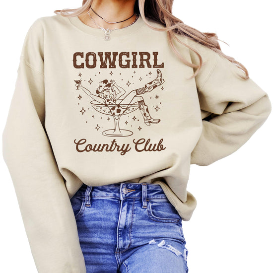 Front view of Cowgirl Country Club sweatshirt showing bold western country club graphic print