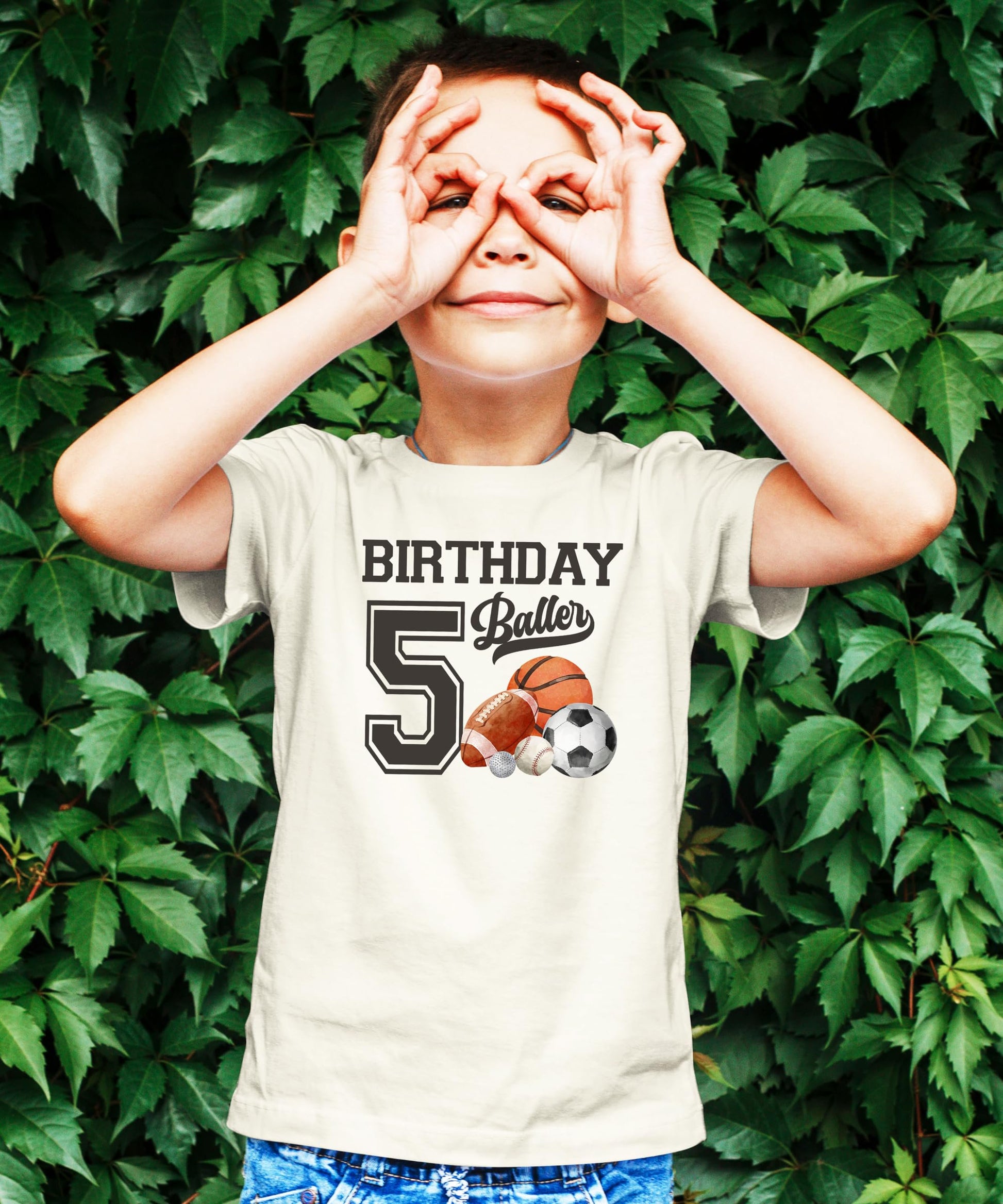 Detail shot of high-quality sports birthday graphic on black kids t-shirt