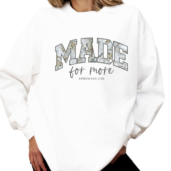 Side view of women's camo pullover sweatshirt with Christian message