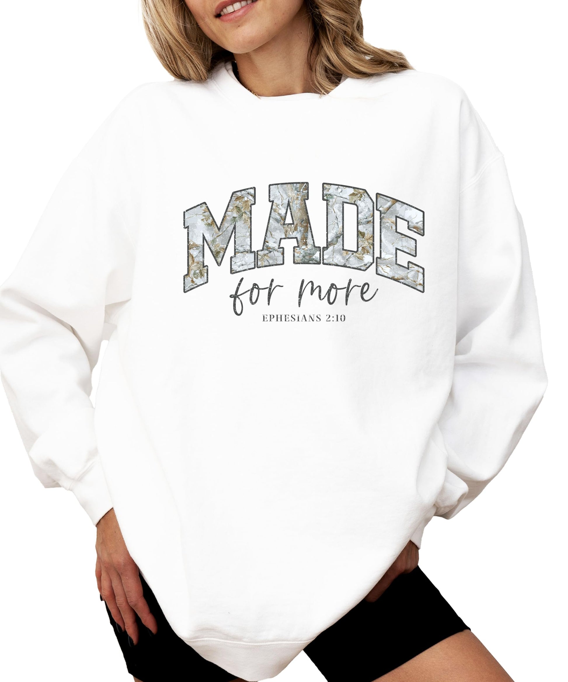 Side view of women's camo pullover sweatshirt with Christian message