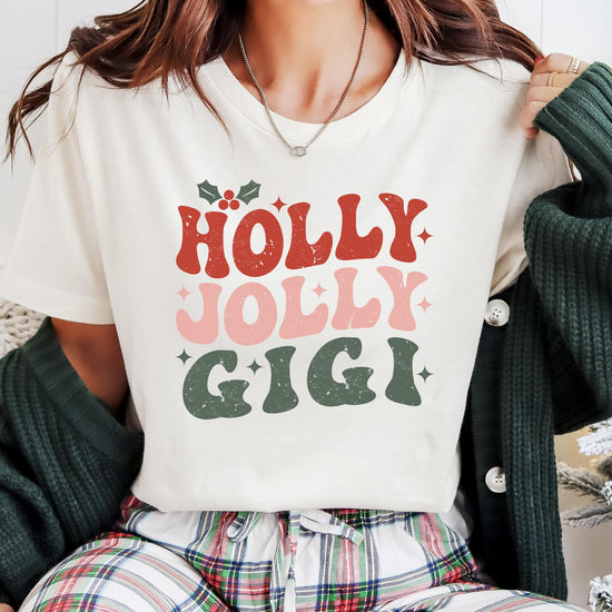 Front view of Holly Jolly Gigi holiday graphic tee for grandma on natural colored shirt