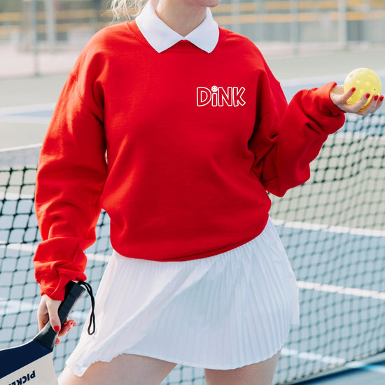 Lifestyle photo of Dink pickleball sweatshirt styled casually
