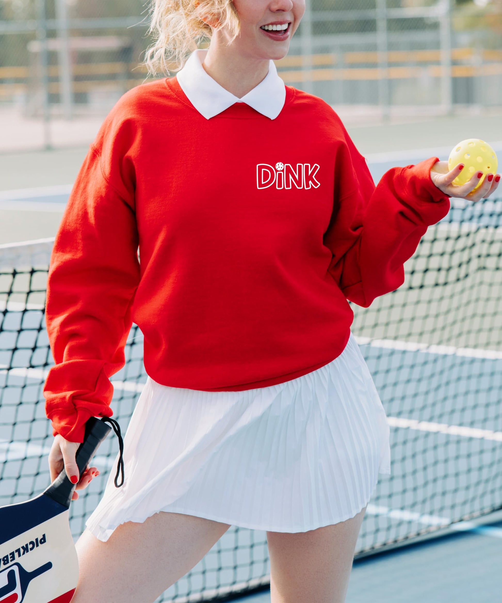 Lifestyle photo of Dink pickleball sweatshirt styled casually