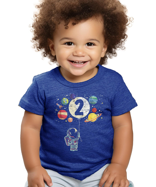 Front view of black kids space birthday shirt with rocket and planet design by Olive Loves Apple