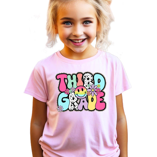 Retro groovy Third Grade shirt for girls with colorful flowers and bubble letters on natural youth tee