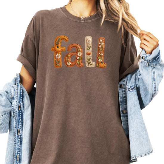 Side view of women's trendy fall tee with faux stitched design