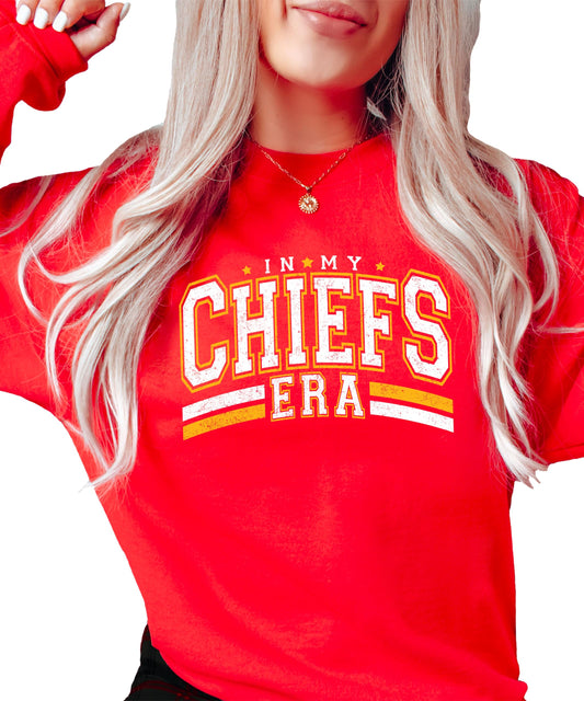 Close-up of In My Chiefs Era bold graphic print on red sweatshirt