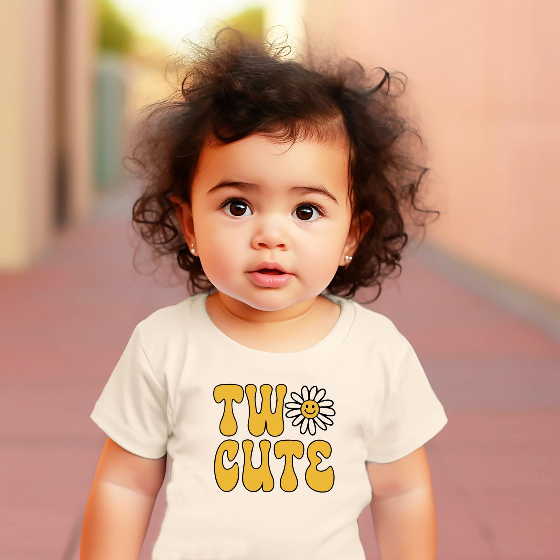 Toddler girl wearing Two Cute 2nd birthday outfit with daisy graphic tee