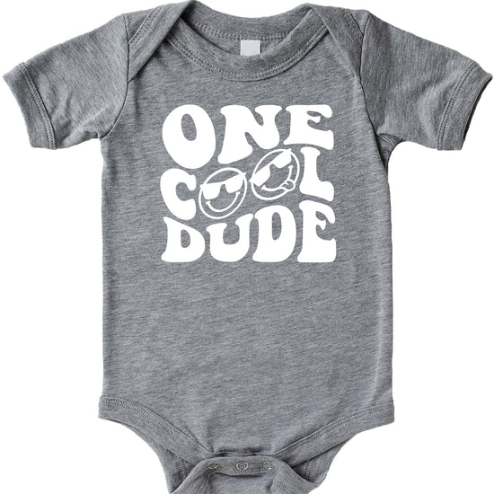 Close-up of One Cool Dude retro print design on black boys birthday shirt