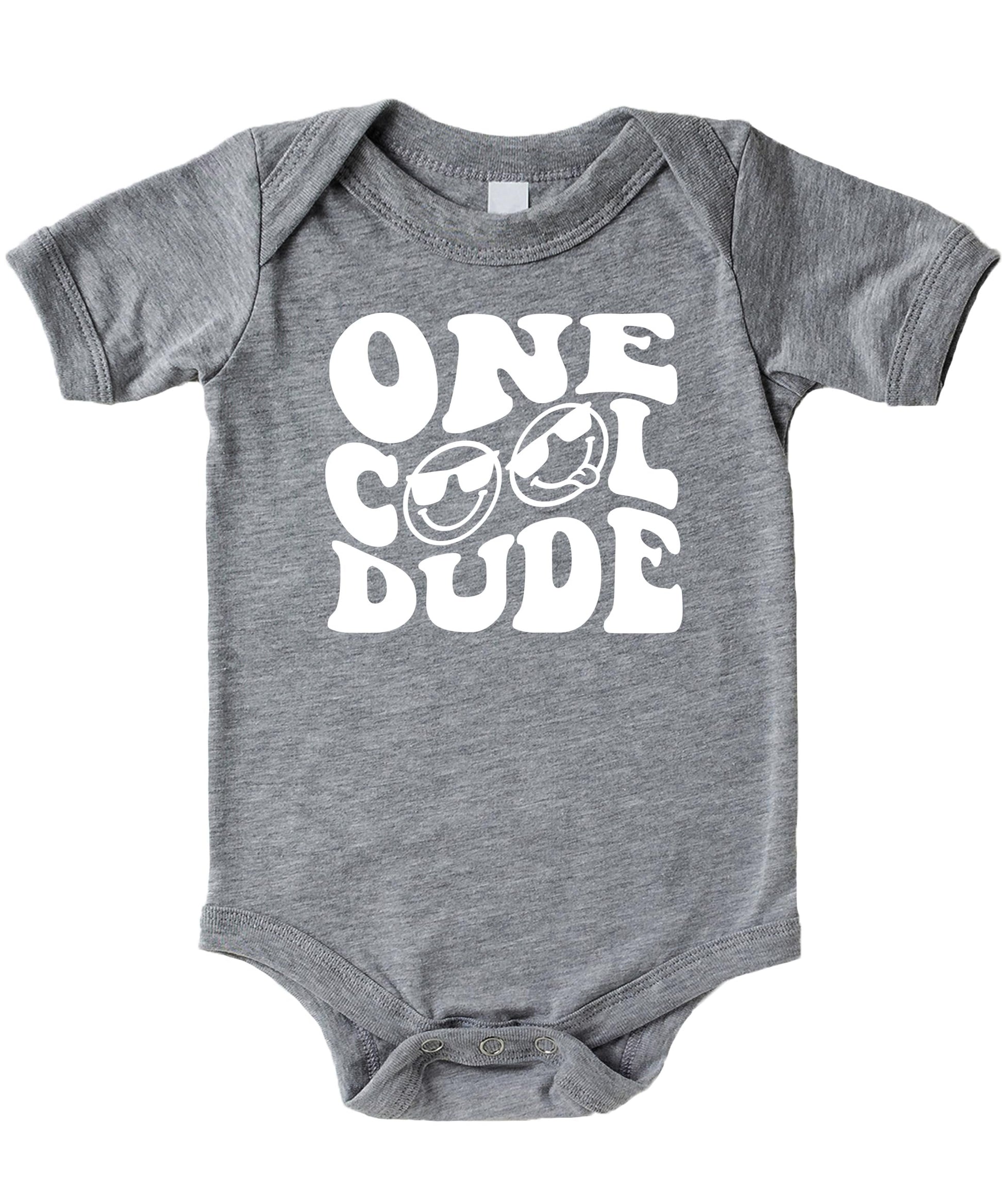 Close-up of One Cool Dude retro print design on black boys birthday shirt