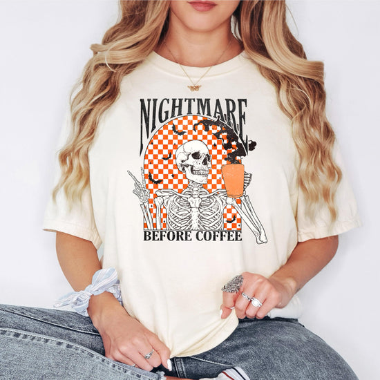 Nightmare Before Coffee women's Halloween shirt laid flat showing full skeleton and bats retro design