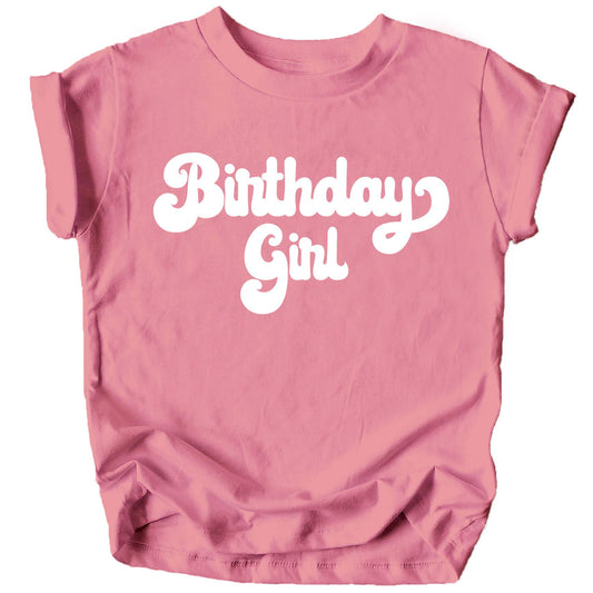 Close-up of retro birthday girl colorful print on toddler shirt