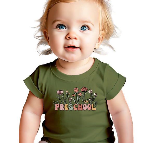 Close-up of wildflower and pastel retro lettering preschool shirt design for girls