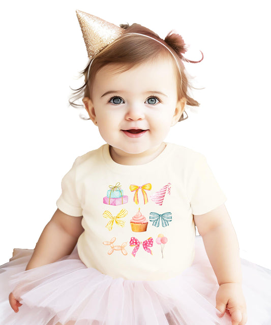 Girly coquette birthday graphic tee for toddlers and girls with watercolor cupcakes, bows, and balloons design in pink
