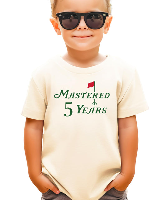 Mastered 5 Years golf-themed fifth birthday t-shirt for kids in natural color, front view